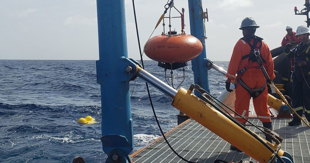 CSA Ocean Sciences Team Member Deploying ADCP